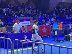 Afghan taekwondo athlete downs Japanese opponent, reaches next round