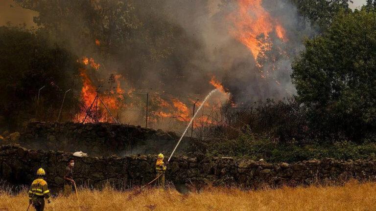 Wildfires force evacuation of more than 220,000 in France, Spain