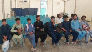 Nearly 400 Afghans released from Pakistani prisons, return home