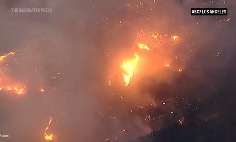 Wildfires destroy homes, force thousands to evacuate in California